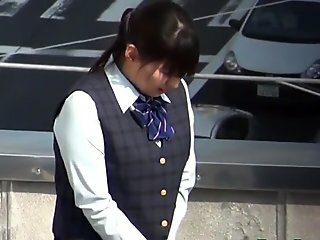 Asian teen pissing herself